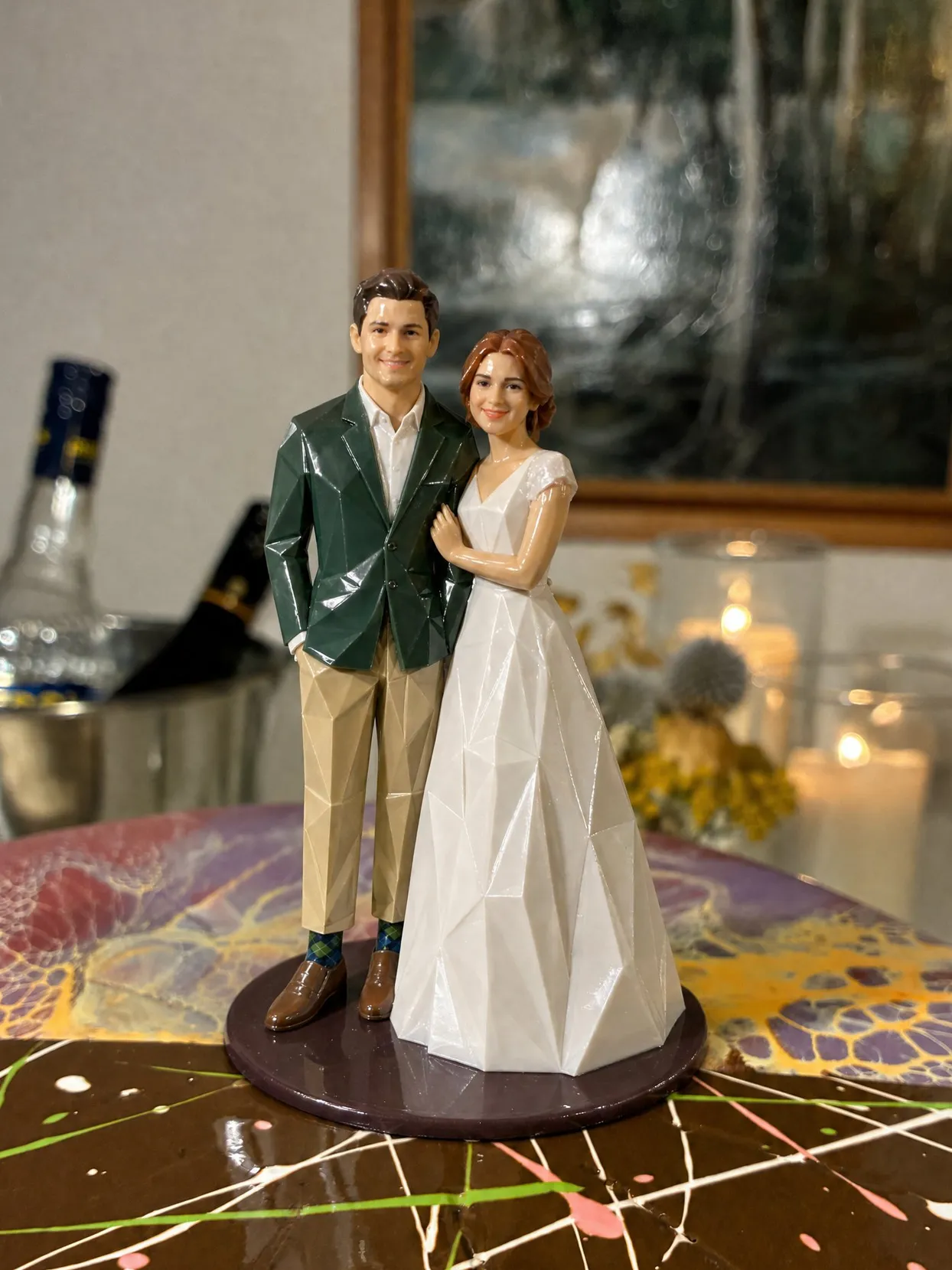 The same topper couple: he in a green sport coat, tan trousers and argyle socks, she in a gown with lace sleeves.